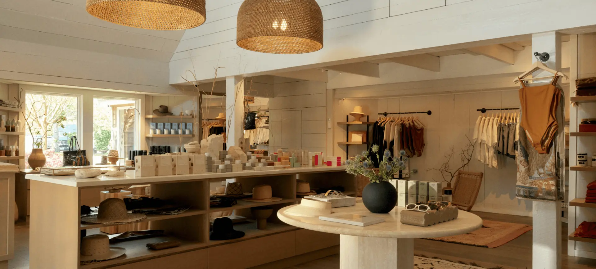 A shop displaying various products on tables for customers to browse and purchase.